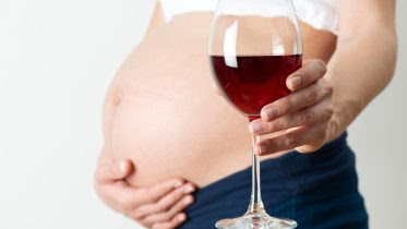 Image name: Drinking-Wine-Pregnant-Woman-Alcohol.jpg