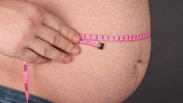 Image name: Obese-Man-Tape-Measure-Fat-777x583.jpg